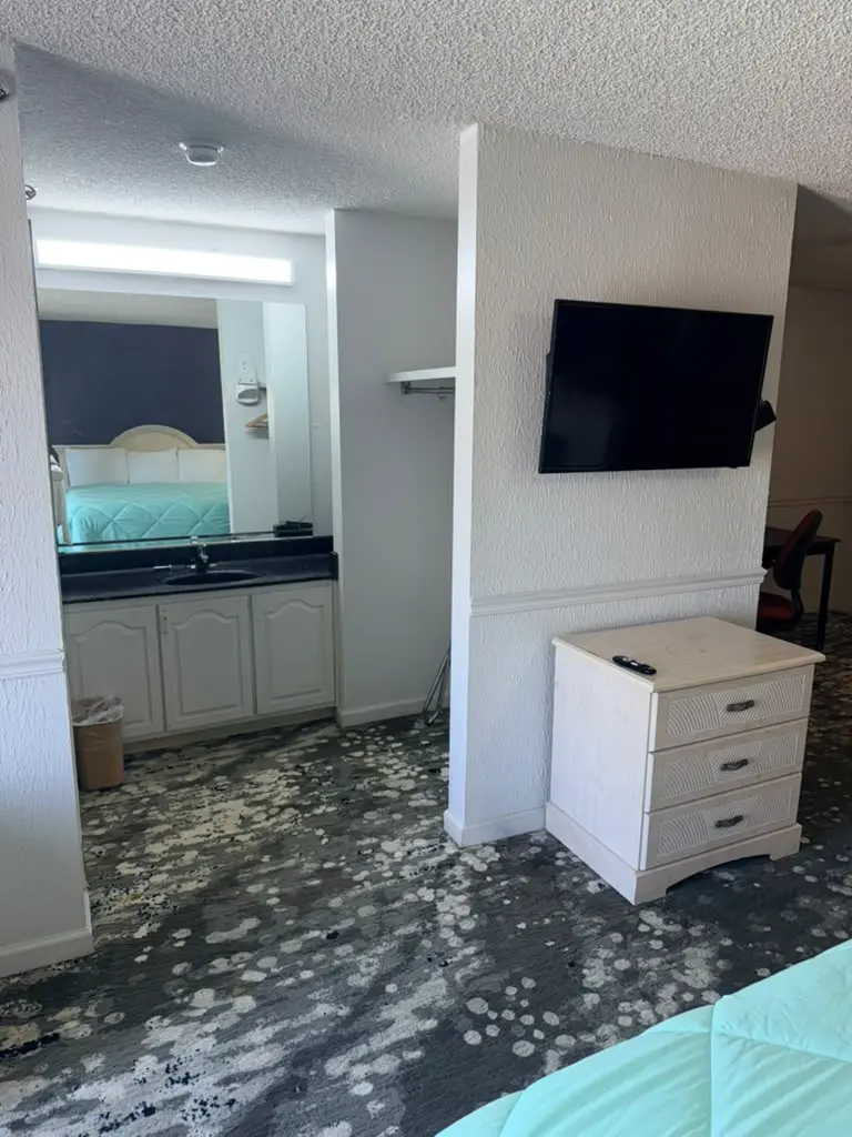 Non-smoking king suite vanity and television area