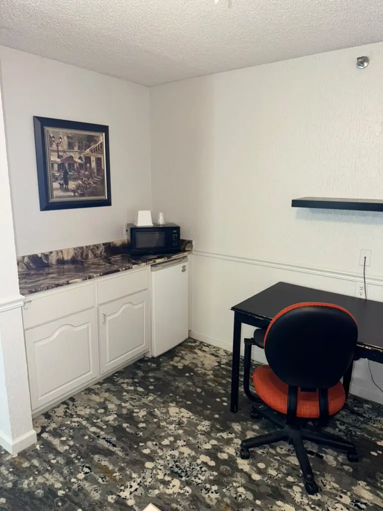 Non-smoking king suite kitchenette and workspace